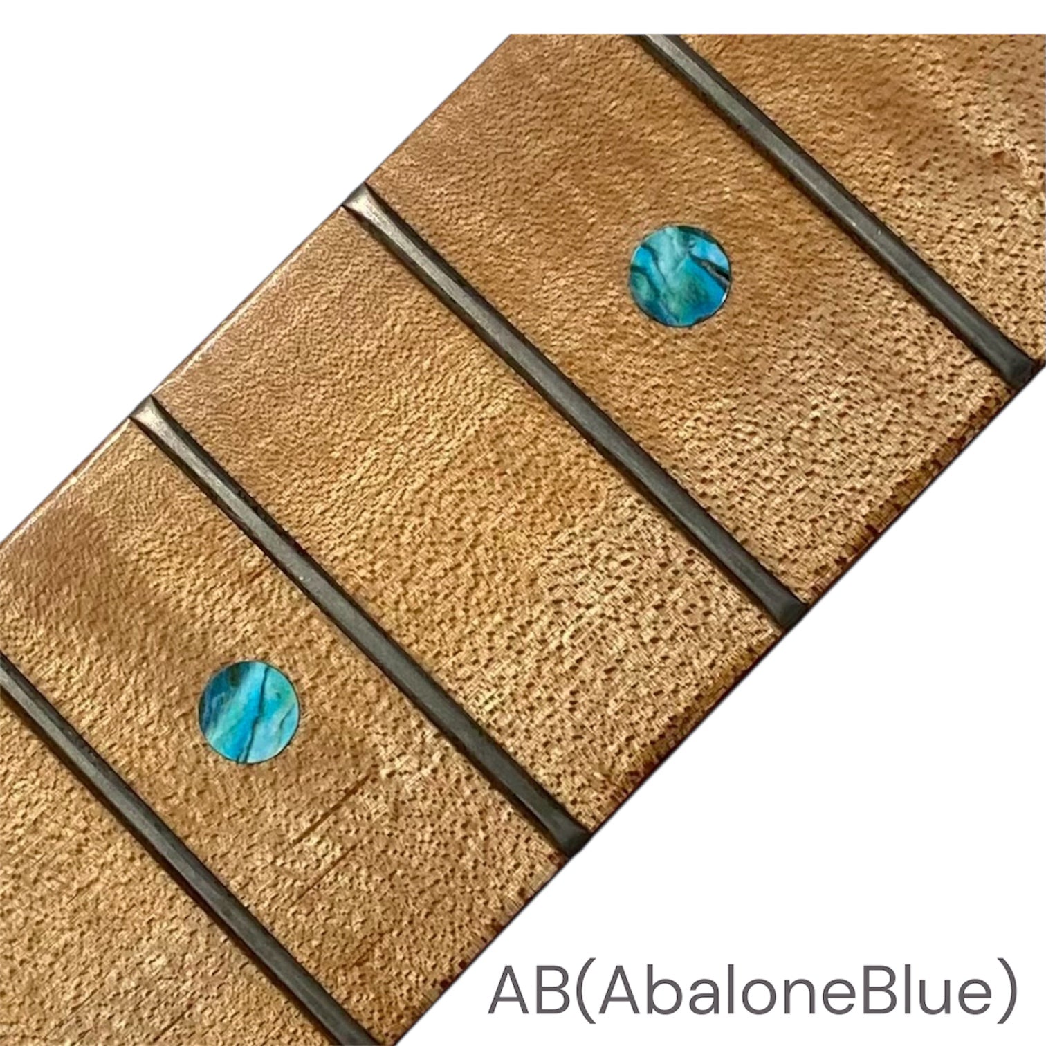 Close-up of a guitar fretboard with abalone blue dot inlay stickers