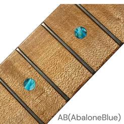 Close-up of a guitar fretboard with abalone blue dot inlay stickers