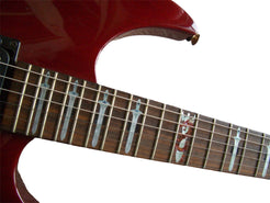 Close-up of a red electric guitar's neck with dragon inlay
