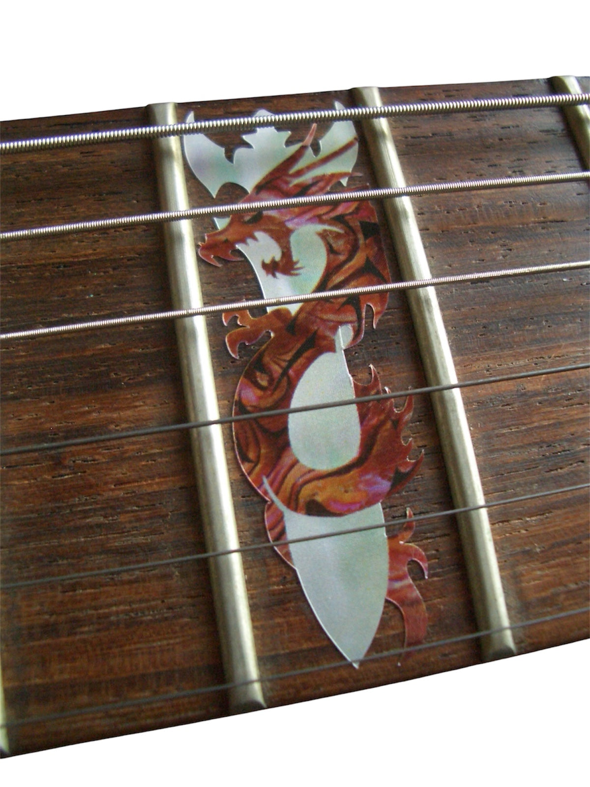 Close-up of a guitar fretboard with decorative inlay